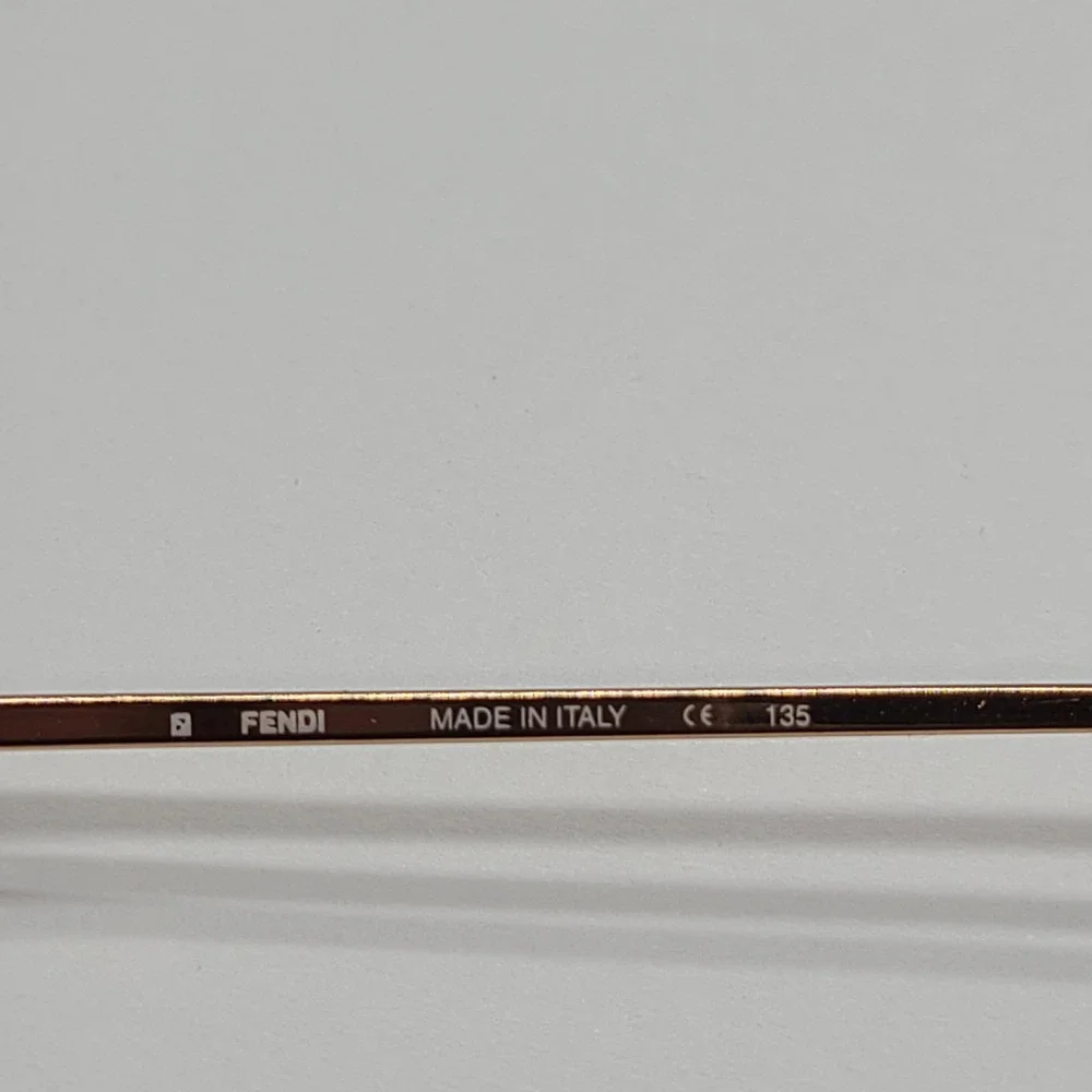 Fendi Pink Lens Rimless Sunglasses with Gold Frame